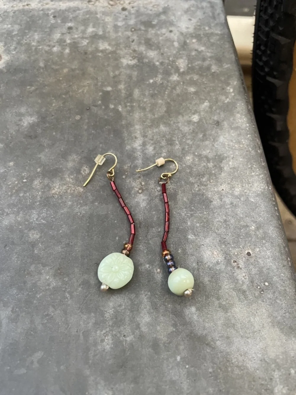 Artisan green and red beaded Drop Earrings with flower etching